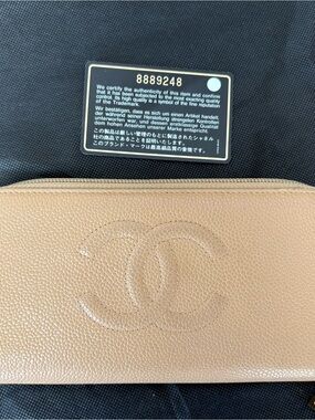 CHANEL Beige Caviar Leather Zip Wallet with Embossed CC